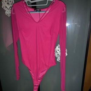 Bright pink bodysuit with sheer sleeves